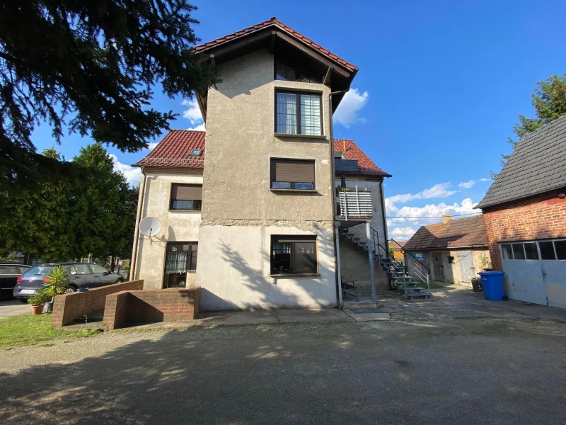 Hausansicht - Zinshaus/Renditeobjekt kaufen in Boxberg - Teilvermietetes Mehrfamilienhaus als Kapitalanlage!