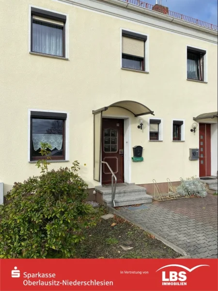 Südostansicht - Haus kaufen in Niesky - In Reih und Glied - Reihenmittelhaus in Niesky !