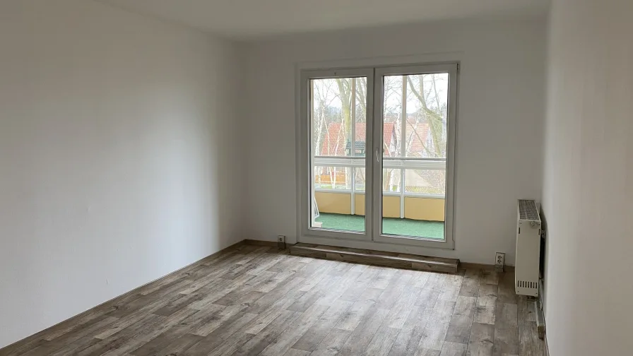 Wohnzimmer mit Balkon