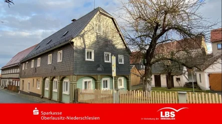 Straßenansicht - Haus kaufen in Obercunnersdorf - Ein Bild von einem Haus