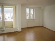 Wohnzimmer mit Balkon