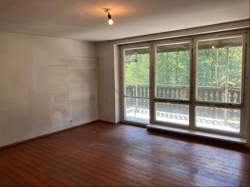 Schlafzimmer mit Zugang zum Balkon