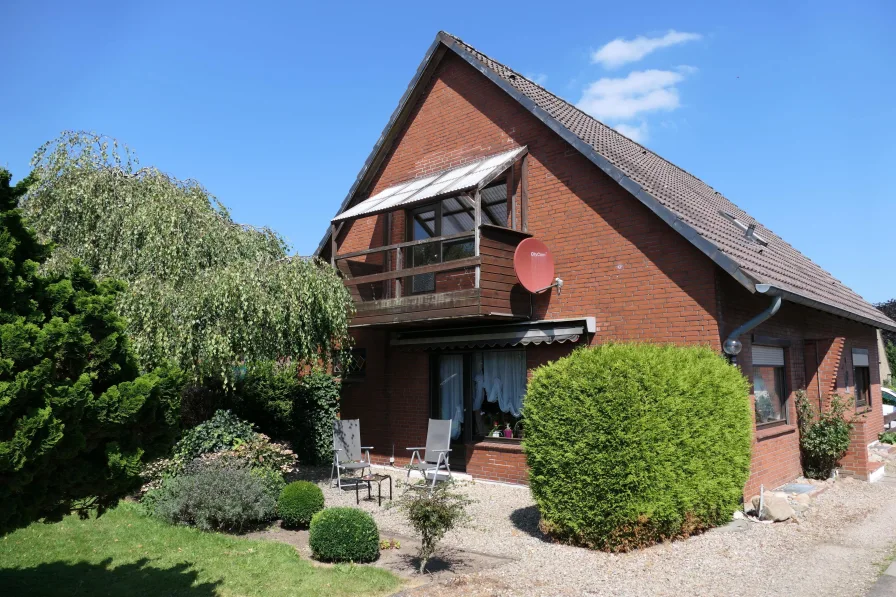 Gartensicht - Haus kaufen in Busdorf - Sonniges, solides Familienhaus mit Potenzial 