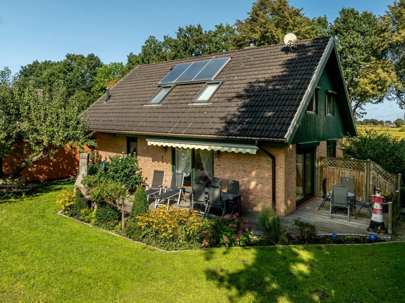 Ihre Wohlfühloase. - Haus kaufen in Neuendeich - Leben am Deich - Ihr Zuhause im Grünen.