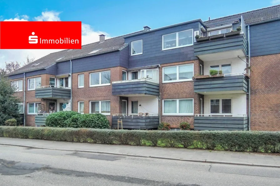 Straßenansicht - Wohnung kaufen in Kiel - 4-Zi.-ETW mit Balkon und Garage im 1. OG