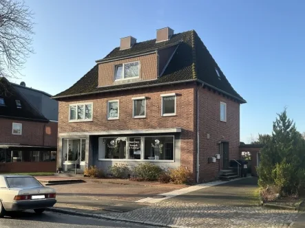 Straßenansicht - Zinshaus/Renditeobjekt kaufen in Bordesholm - Solides 3-Parteien-Haus in Bordesholm!