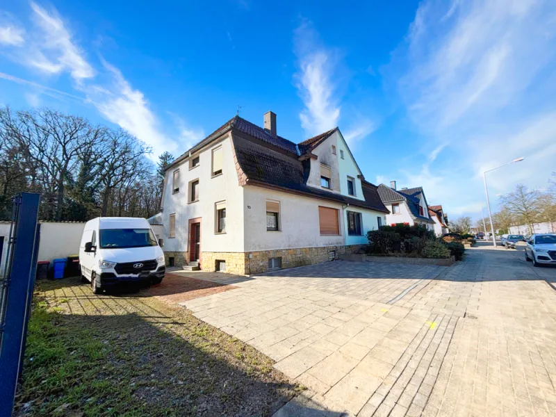 Außenansicht - Haus kaufen in Osnabrück - Leben in bester Lage: Doppelhaushälfte mit 2 WE in Osnabrück-Eversburg