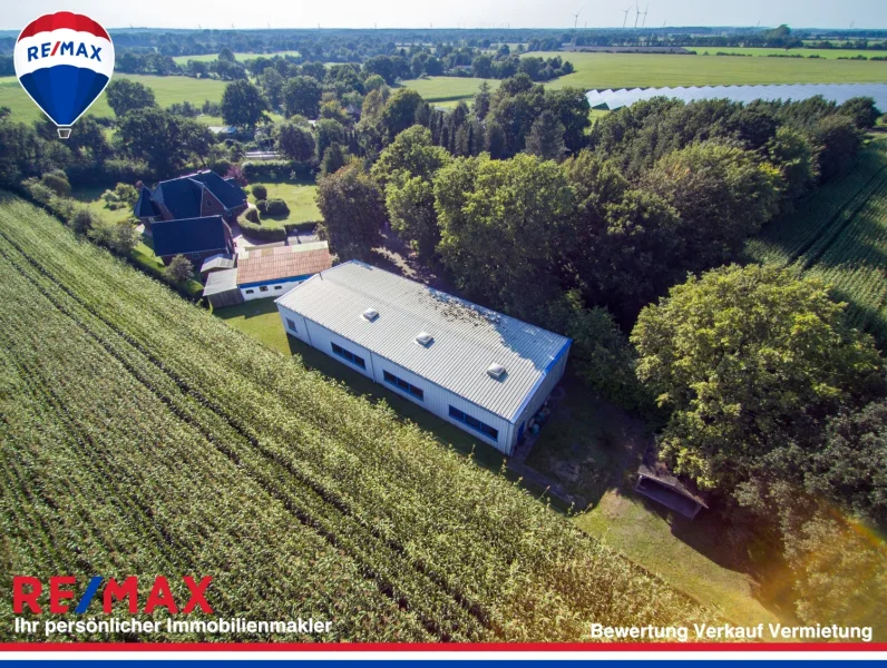 Blick_v.Feld_aufGewerbehalle (1) - Halle/Lager/Produktion kaufen in Bokel - Gewerbe und Wohnen zwischen den Meeren – Jetzt für nur 950.000€!