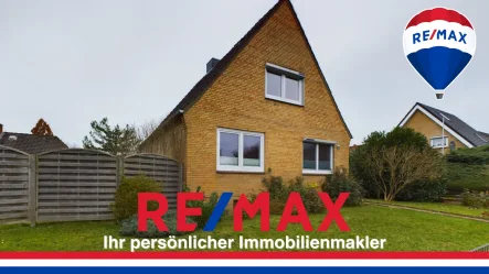 Titelbild - Haus kaufen in Neumünster / Faldera - Einziehen und wohlfühlen! Kernsaniertes Nest für Ihre Familie in ruhiger Lage