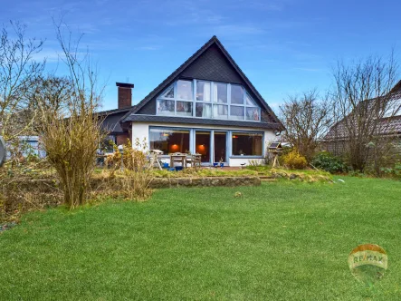 Wohnhaus - Haus kaufen in Bollingstedt - Traumhaftes Refugium am See, Ihr Tor zur Idylle und Erholung