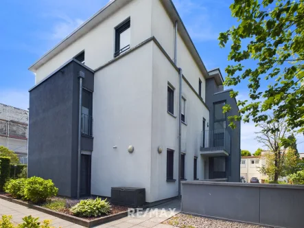 Ansicht - Wohnung kaufen in Weinstadt - Moderne Etagenwohnung mit Balkon und zwei Tiefgaragenstellplätzen