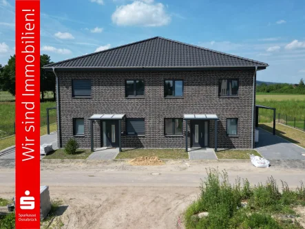 Frontansicht rechte Hälfte - Haus kaufen in Bohmte - Ihr modernes Zuhause aus 2023 mit Weitblick ! 