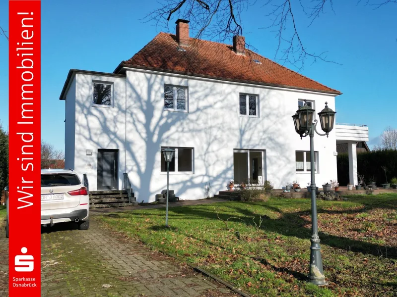 Frontansicht - Haus kaufen in Bad Essen - Teilmodernisiertes ZFH oder Mehrgenerationen-Haus