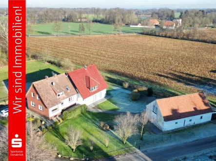 4:3 - Haus kaufen in Ostercappeln - Alt- und Neubau im Paket! Drei Wohnungen im Grünen