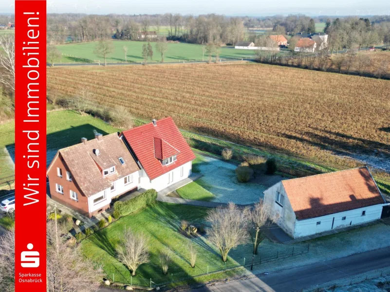 4:3 - Haus kaufen in Ostercappeln - Alt- und Neubau im Paket! Drei Wohnungen im Grünen