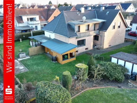 Hinteransicht - Haus kaufen in Ostercappeln - Ihr neues zentrales Zuhause mit viel Platz ! 