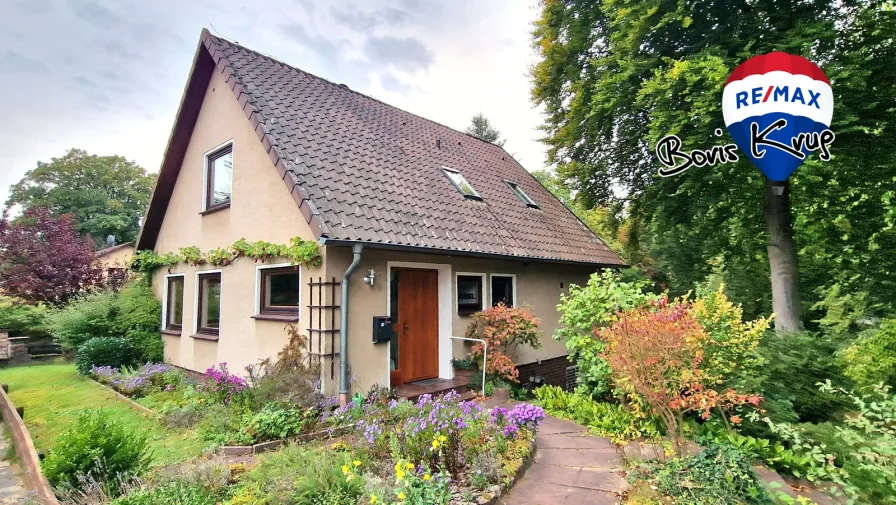  - Haus kaufen in Bomlitz - OHNE KÄUFERPROVISION:Einfamilienhaus mit Einliegerwohnung - Teichgrundstück