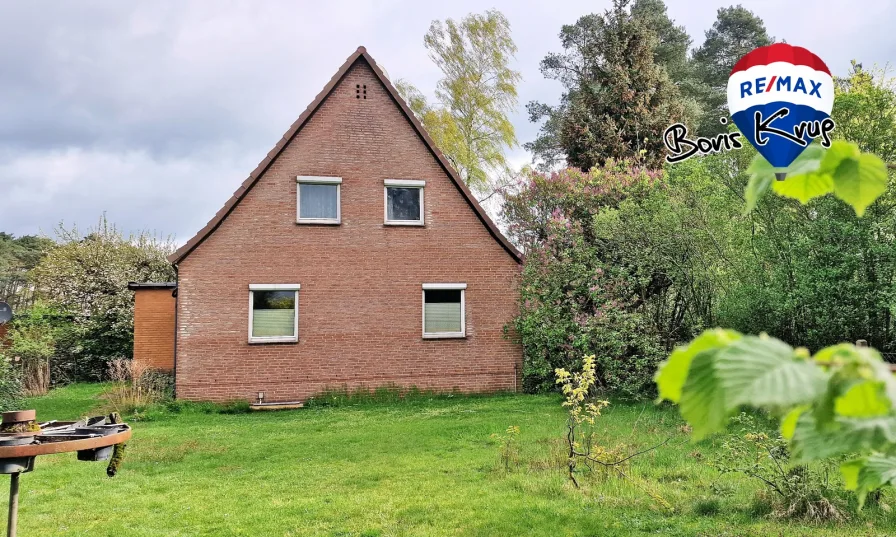 Gartenansicht - Haus kaufen in Buchholz - RESERVIERT: Einfamilienhaus mit XL-Garten und Nebengebäude