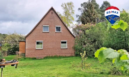 Gartenansicht - Haus kaufen in Buchholz - OHNE KÄUFERPROVISION: Einfamilienhaus mit XL-Garten und Nebengebäude