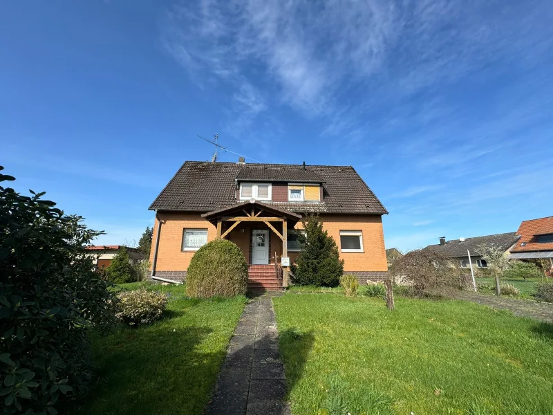Außenansicht - Haus kaufen in Hodenhagen - RESERVIERT! Für die Familie - Einfamilienhaus mit großem Grundstück