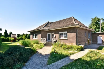  - Haus kaufen in Rodewald - Wohnen auf einer Ebene: Modernisierter Bungalow in Rodewald