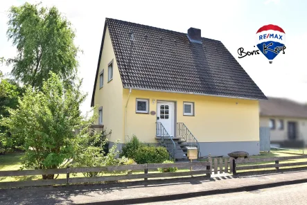 Straßenansicht - Haus kaufen in Hodenhagen - Einfamilienhaus in Hodenhagen mit XL-Garage