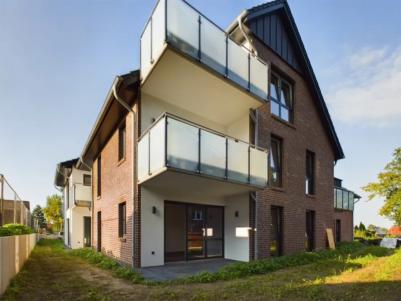 Ansicht Haus - Wohnung kaufen in Wedemark / Mellendorf - 2-Zimmer Erdgeschosswohnung mit Terrasse - Neubau mit Sonderabschreibung