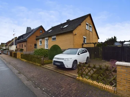 Seitenansicht - Haus kaufen in Neustadt am Rübenberge / Bordenau - Einfamilienhaus am Bordenauer See