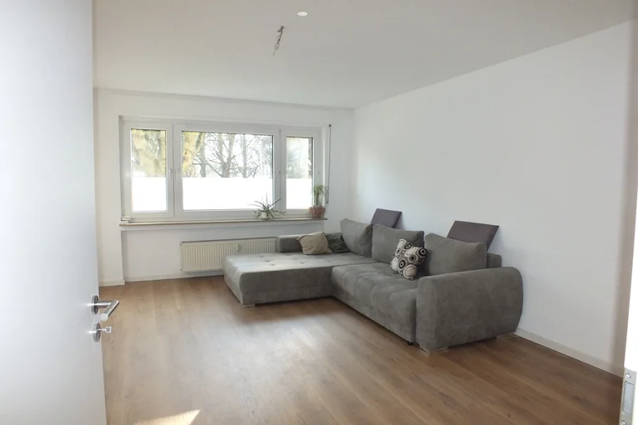 Wohnzimmer - Wohnung kaufen in Oberursel / Stierstadt - Helle und Moderne 2-Zimmer-Wohnung mit sonnigem Balkon in ruhiger Lage