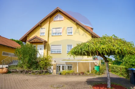 Hausansicht - Wohnung kaufen in Bodelwitz - Helle Souterrainwohnung mit überdachter Terrasse und Stellplatz in Ortsrandlage