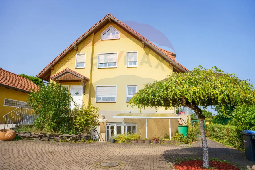 Hausansicht - Wohnung kaufen in Bodelwitz - Helle Souterrainwohnung mit überdachter Terrasse und Stellplatz in Ortsrandlage