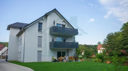 Außenansicht - Wohnung mieten in Trockenborn-Wolfersdorf - Attraktive 3-Raum Dachgeschosswohnung direkt am See in Wolfersdorf