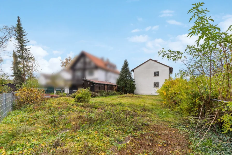 Grundstück mit Altbestand - Grundstück kaufen in Freising - Idyllisches Grundstück mit Riesenpotenzial in ruhiger Wohngegend mit Altbestand