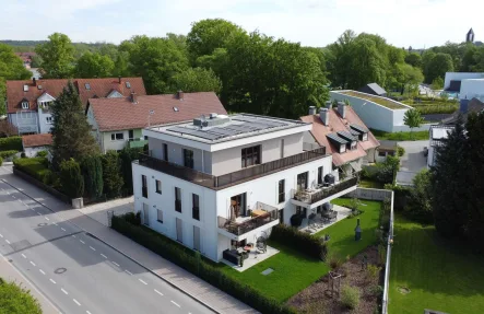 Außenbild  - Wohnung mieten in Freising - Energieeffiziente 4-Zimmer Etagenwohnung mit großem Balkon & niedrigen Nebenkosten