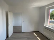 Blick vom kleinen Zimmer ins mittlere Zimmer