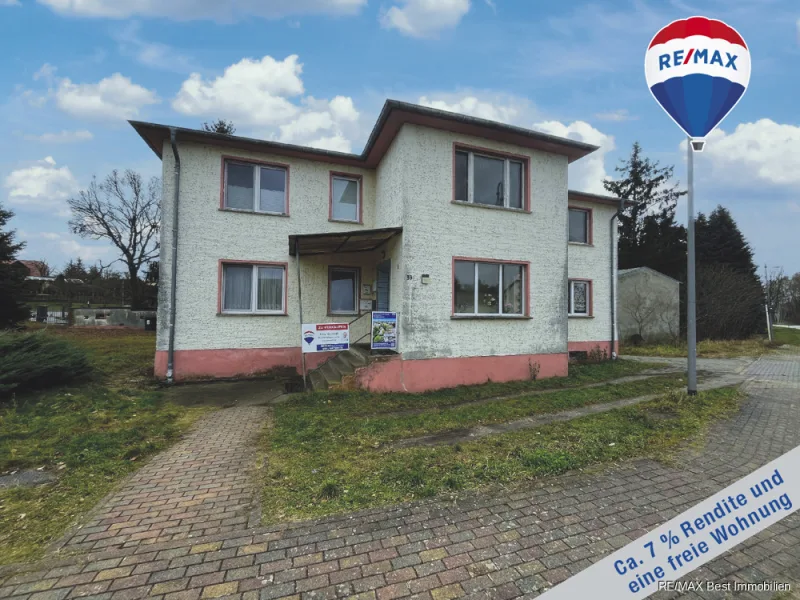 Titelbild - Haus kaufen in Bremsdorf - Renditestarkes MFH mit 2,5 Zimmer WE zur Selbstnutzung