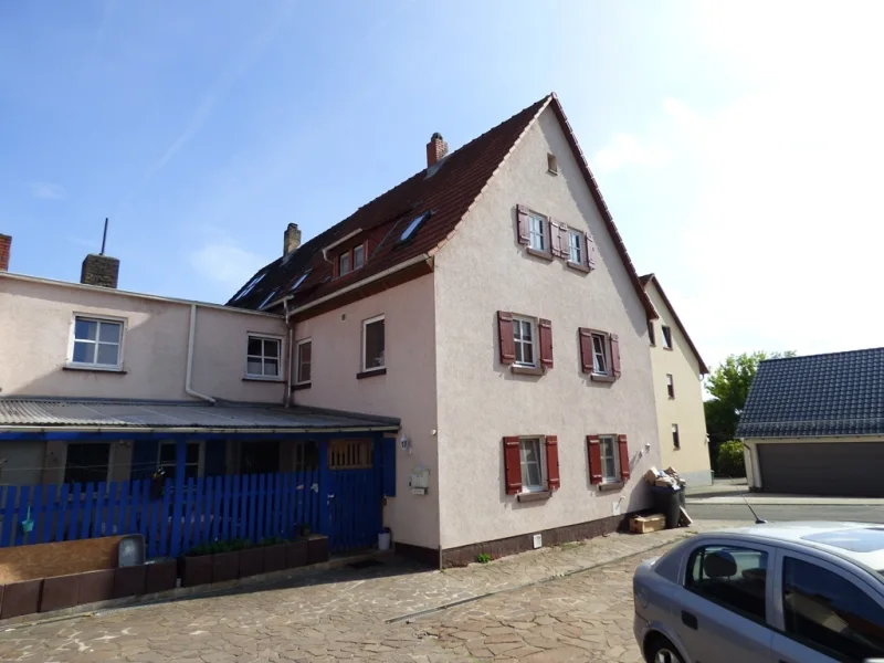 it50 - Haus kaufen in Obernburg am Main - Keine Käuferprovision! Kaufen Sie ab € 557,- mtl.* ! EFH m. Anbau & überd.Terrasse (Kein Garten)