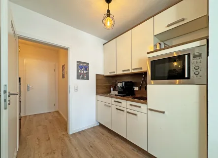  - Wohnung kaufen in Butzbach - Vermietetes 1-Zimmer Appartement mit Terrasse und Außenstellplatz in schöner Lage