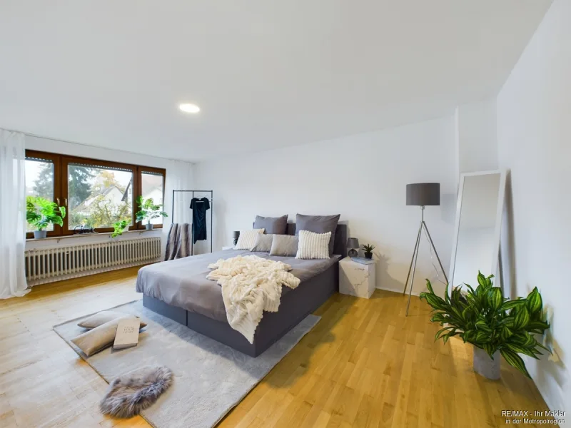 Schlafzimmer - Wohnung kaufen in Oberasbach - Freundliche Wohnung mit Gartenanteil, Balkon und Garage in ruhigem 3-Familien-Haus