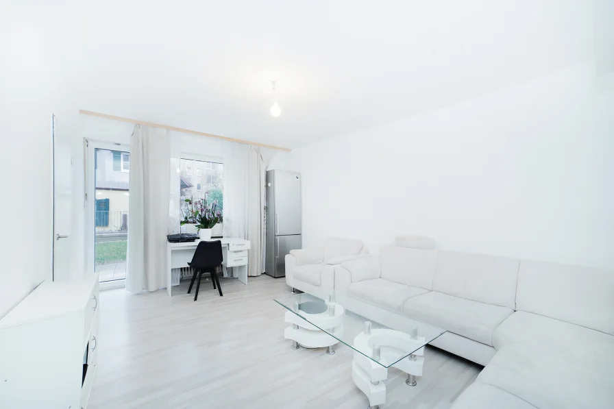 Individuelle Wohnqualität - Wohnung kaufen in München - Ruhige 2-Zimmer Wohnung mit Süd-Terrasse und grünem Innenhof
