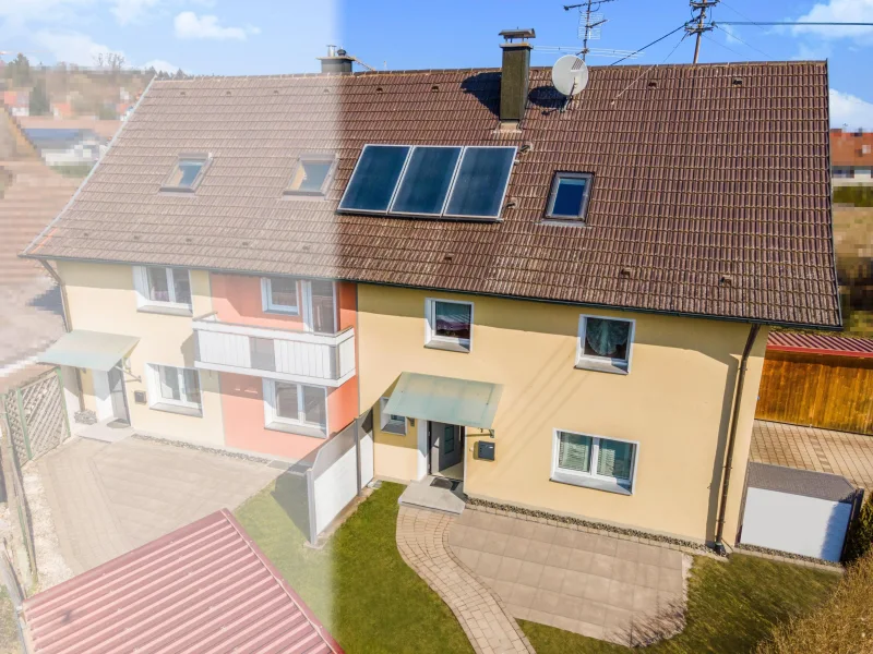 10360r - Haus kaufen in Tannheim - Gemütliche DHH zum Sofort-Bezug!