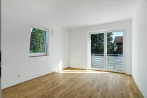 Schlafzimmer mit Zugang zum Balkon