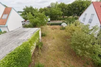 Aussicht vom Balkon in den Garten