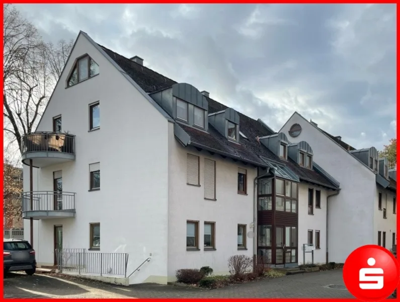 Titelbild - Wohnung kaufen in Nürnberg - 2-Zimmer-Erdgeschosswohnung mit Garten und Tiefgaragenstellplatz in Röthenbach b. Schw.