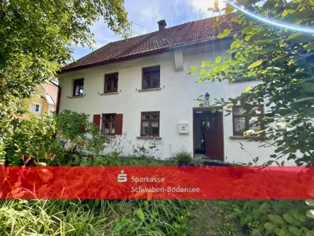 Außenansicht - Haus kaufen in Lautrach - Einfamilienhaus mit großen Lagerflächen in Lautrach