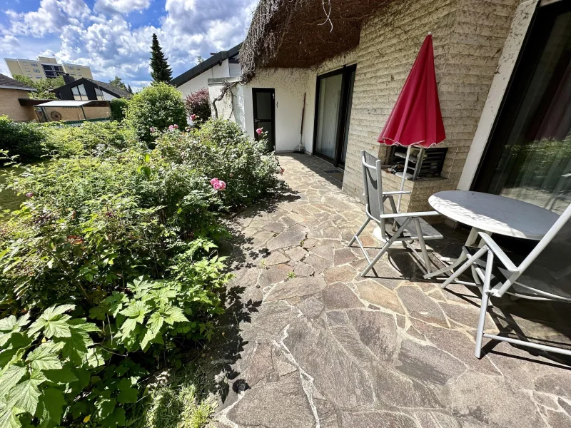 Terrasse mit offenem Kamin