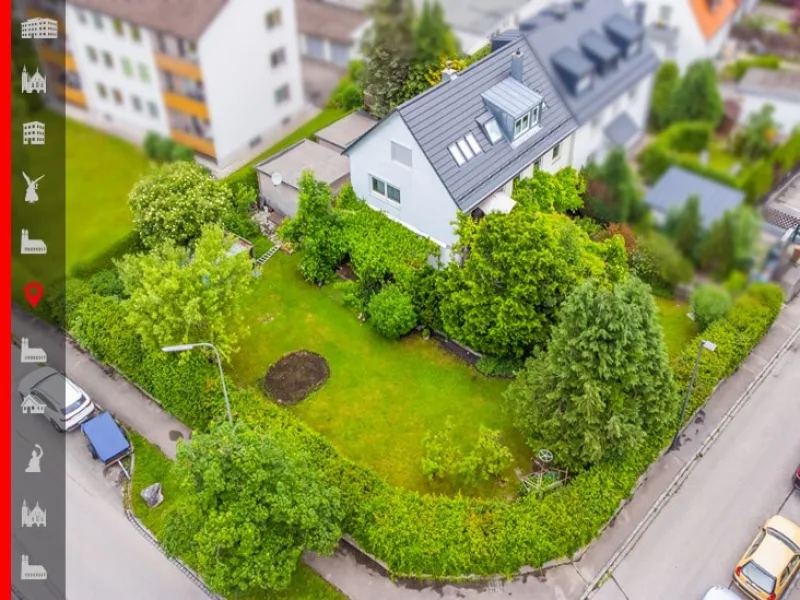 Hausansicht - Haus kaufen in Gräfelfing - Eigennutzung im EG möglich! Vermietetes 3-Parteien-Haus auf sonnigem Eckgrundstück in ruhiger Lage