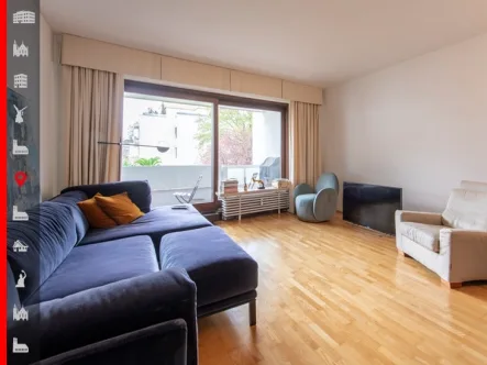 Wohnzimmer - Wohnung kaufen in Grünwald - Mitten im Grünen! Absolut ruhig gelegene 3-Zimmer-Wohnung am Isarhochufer