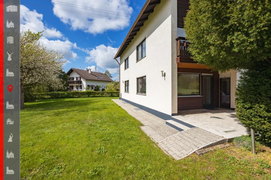 Objektansicht - Haus kaufen in Apfeldorf - Ruhiges Wohnen im Grünen: Freistehendes Haus mit Gartenparadies und Doppelgarage 