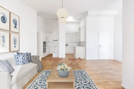 Blick von Wohnraum auf Küche - Wohnung kaufen in München - Über den Dächern von München! Exklusive Neubauwohnung mit Blick auf Frauenkirche